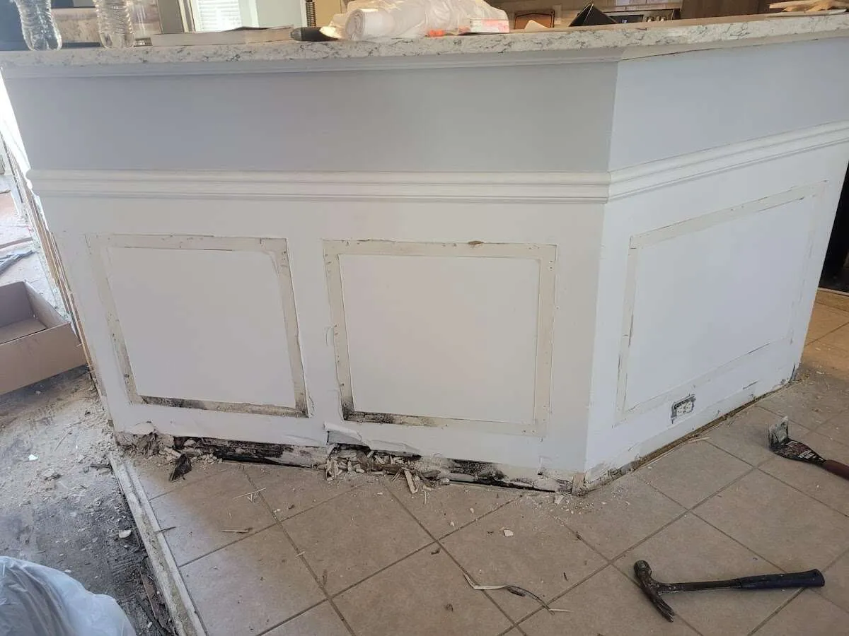 Water damage and mold on kitchen during Storm Damage Restoration in Yulee